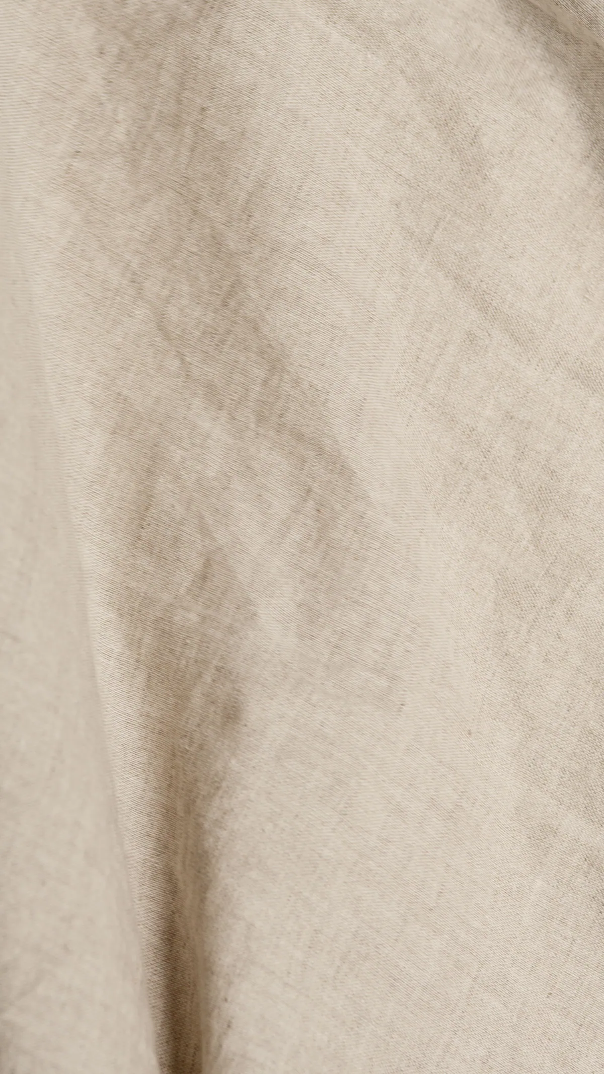 Close detail of a fold in beige textile